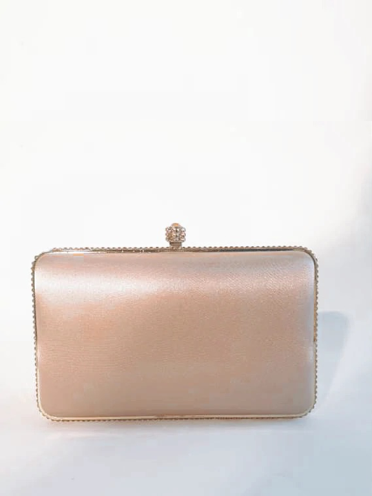 champagne and rose gold clutch